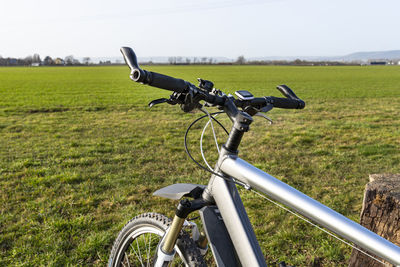 Bicycle handlebar seen from the first person perspective. bicycle frame and bicycle accessories