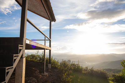 Built structure on landscape against sky