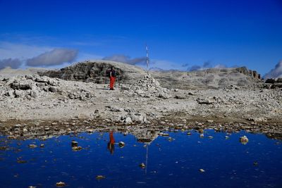 Scenic view of snowcapped mountains against clear blue sky