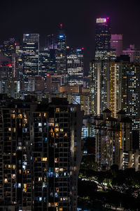 Illuminated city lit up at night