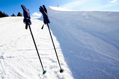 People skiing on snow covered mountain