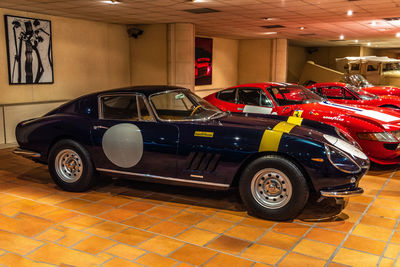 Vintage car parked at night