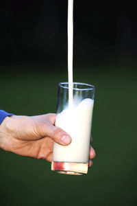 Close-up of hand holding drink