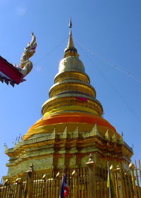 Low angle view of statue of temple against clear sky