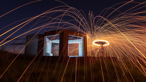 Light painting of firework display at night