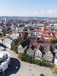 High angle view of buildings in city against sky