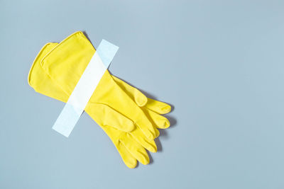 Close-up of yellow paper over white background