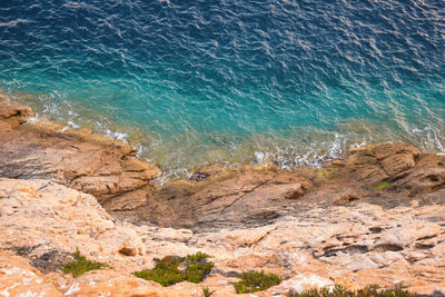 High angle view of rocks on beach