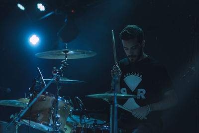 Young man at music concert