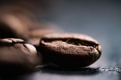 Close-up of coffee beans on table