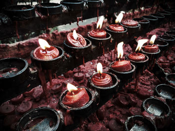 High angle view of illuminated candles on building