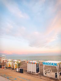 Scenic view of beach against sky during sunset