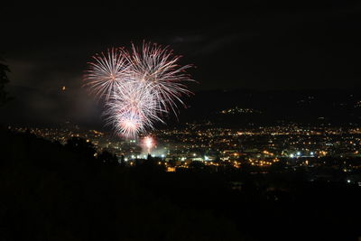 Firework display at night