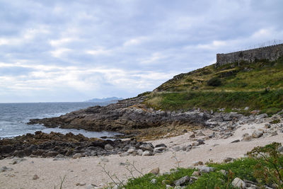 View of the beach of os frades in baiona - spain. small beach located next to the fortress 