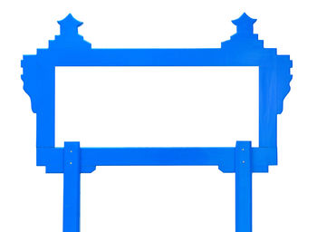 Low angle view of sign against white background