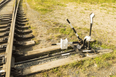 High angle view of railroad track amidst field