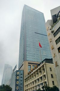 Low angle view of skyscraper against sky