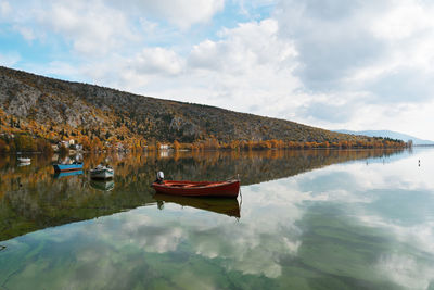 Boats in the calm water of the lake