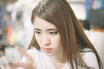 Close-up portrait of a young woman