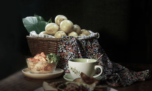 Still life of potatoes in basket