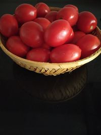 High angle view of fruits in basket on table