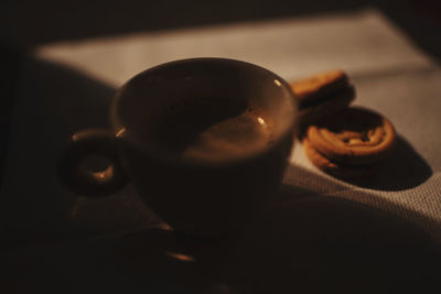 Close-up of coffee cup on table