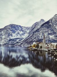 Scenic view of snowcapped mountains and lake against sky