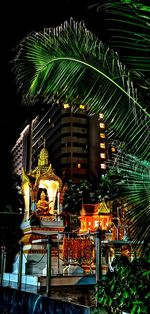 Illuminated statue of building at night