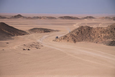 Scenic view of desert against sky