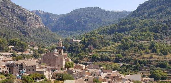 High angle view of townscape and mountains