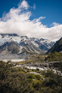 Scenic view of snowcapped mountains against sky