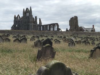 Old ruin building on field