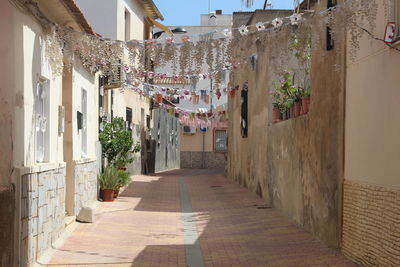 Street amidst buildings in town