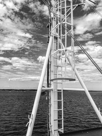 Sailboat on sea against sky