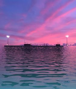 Scenic view of sea at sunset