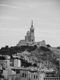 View of cathedral in city against sky