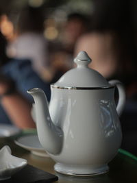 Close-up of kettle on table