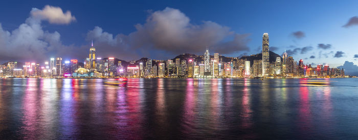 Illuminated buildings in city at night