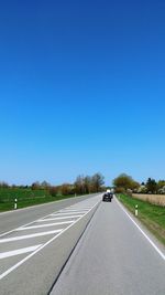 Road against blue sky