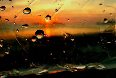 Full frame shot of wet glass window