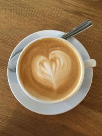 Directly above shot of cappuccino on table