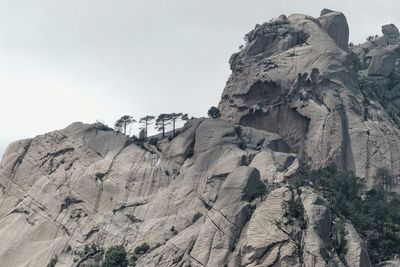 Scenic view of rocky mountains against sky