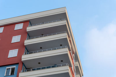 Modern ventilated facade with balconies. 