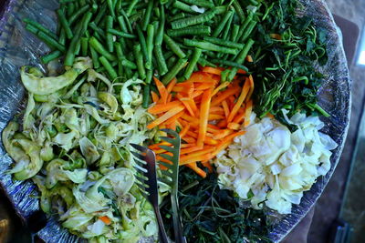 High angle view of chopped vegetables in container