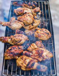 Close-up of meat on barbecue grill