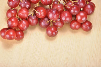 Close-up of red grapes on a table