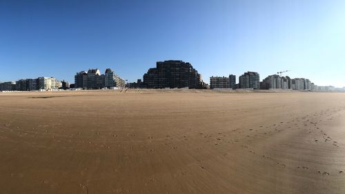 View of beach with buildings in background