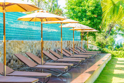 Chairs and tables in swimming pool