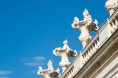 Low angle view of statue against sky