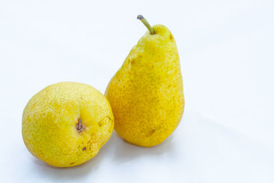 Close-up of fruits against white background